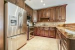 Expansive kitchen offers utmost cooking space for the family chef